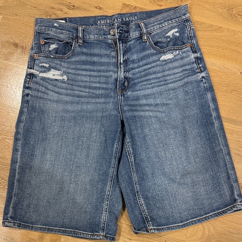 American Eagle Outfitters Distressed Blue Jean below ther knee baggy Shorts